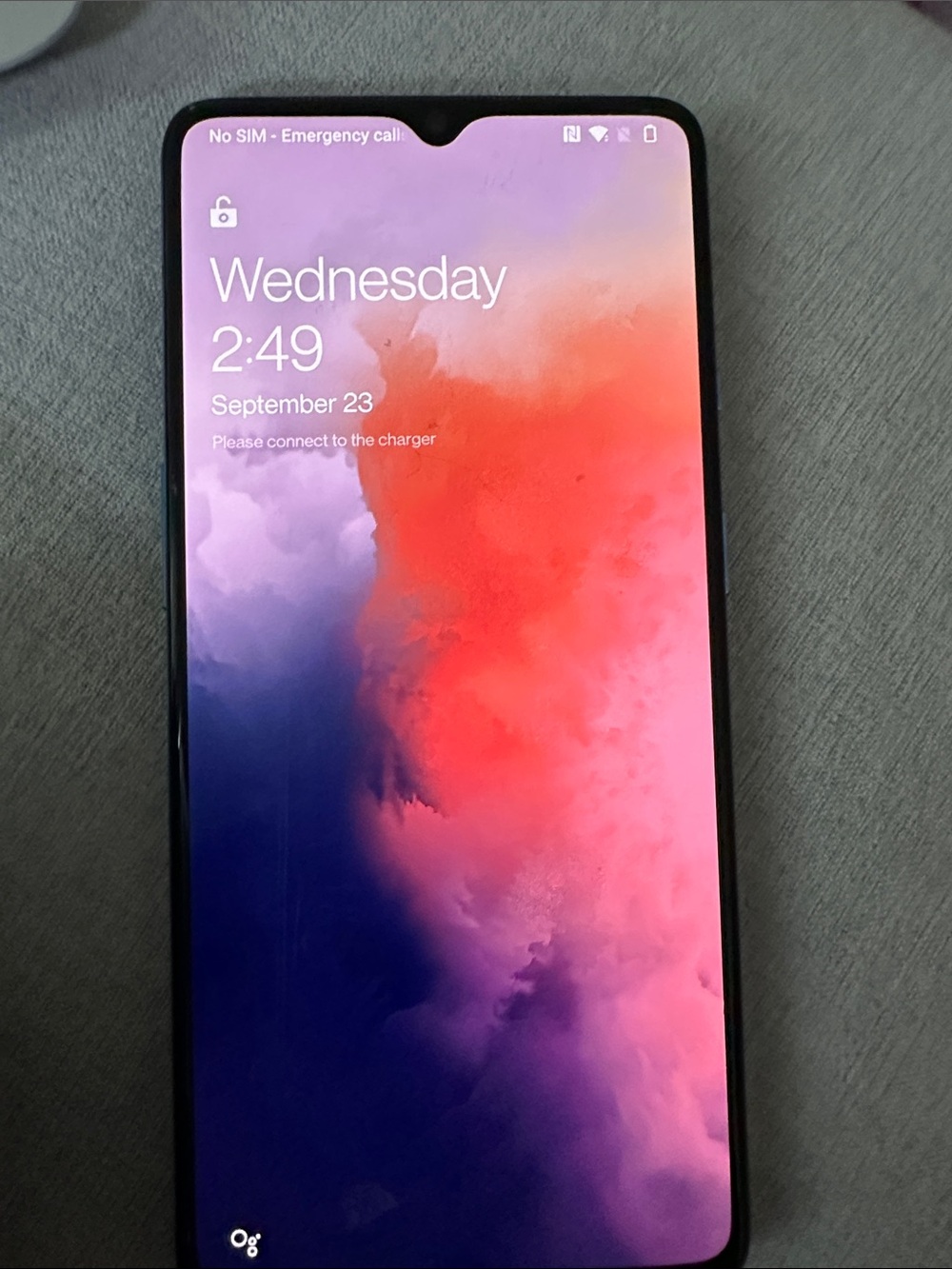 Black Smartphone with Pink-Red Gradient Display - Unbranded